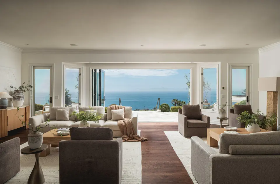 The living room opens to the Pacific