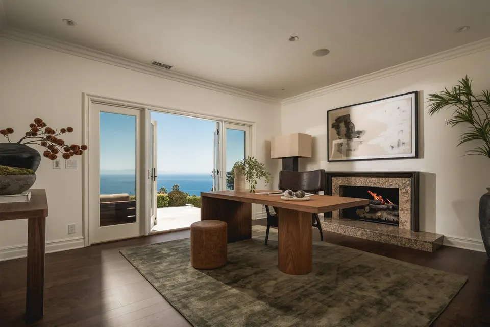 A fireside bedroom sitting area