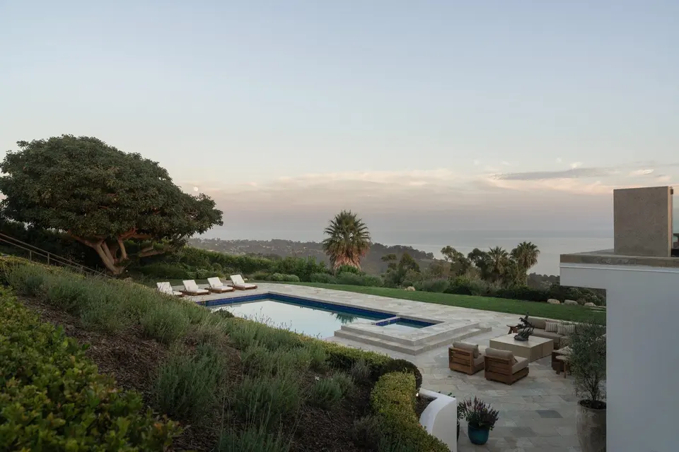 The pool and Pacific at dusk