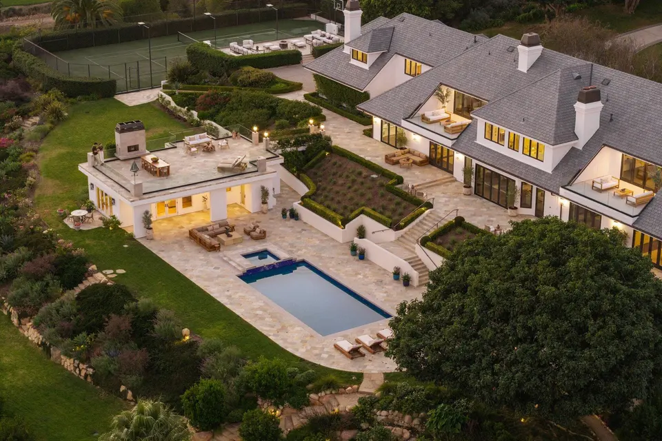 The home, terraces and pool